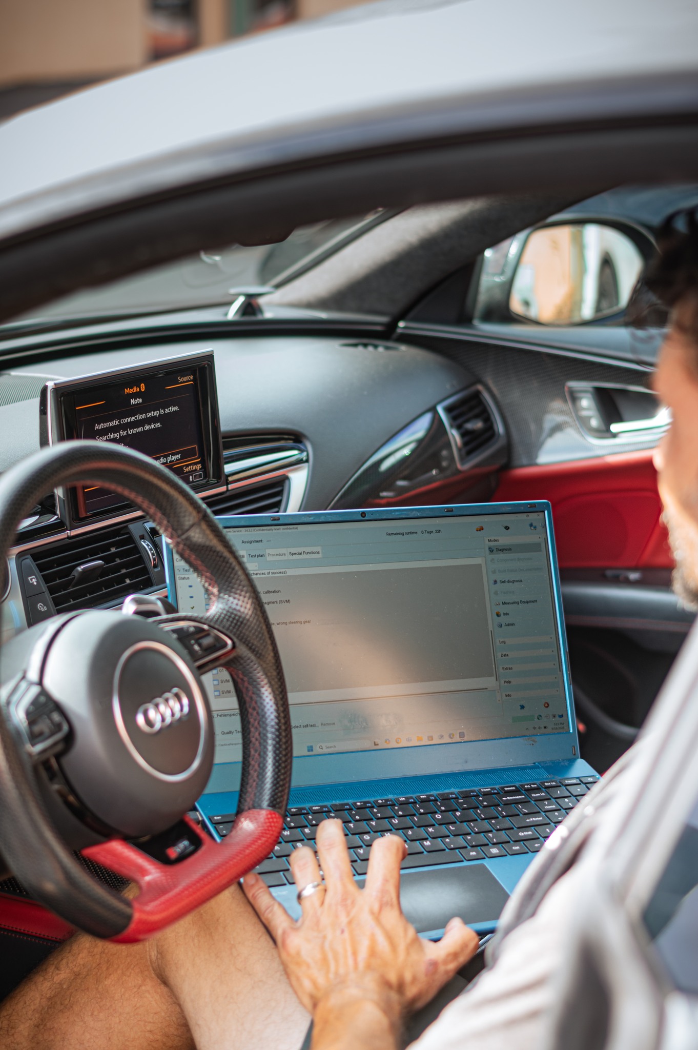Technician performing electrical diagnostics